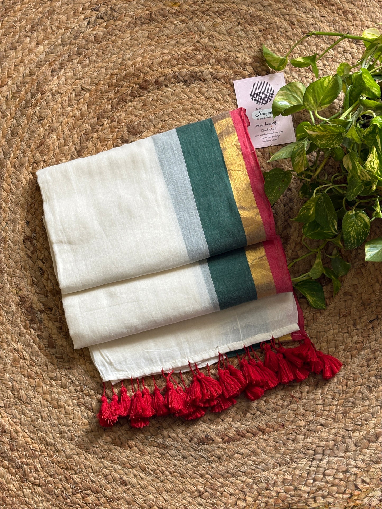 Surabhi l Off white with multi colour border mul cotton saree