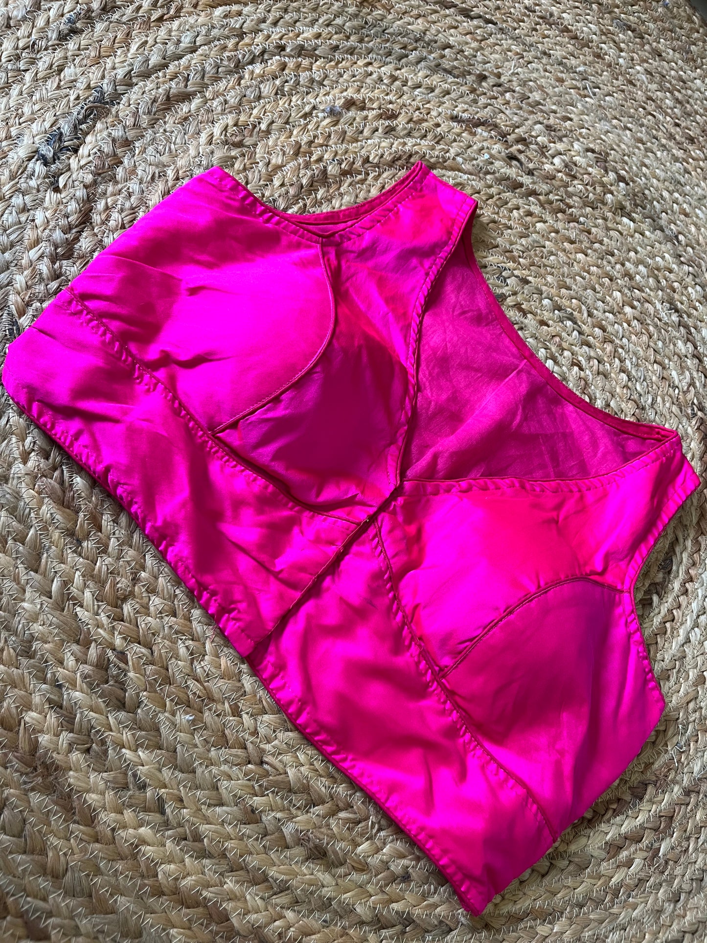 Pink sleeveless blouse